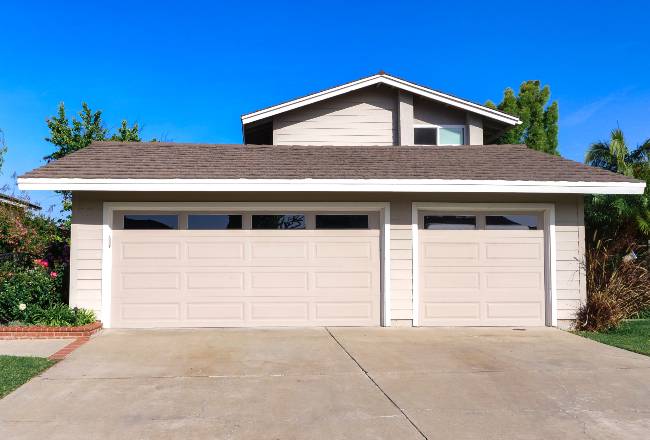 Buying a New Garage Door Versus Repairing